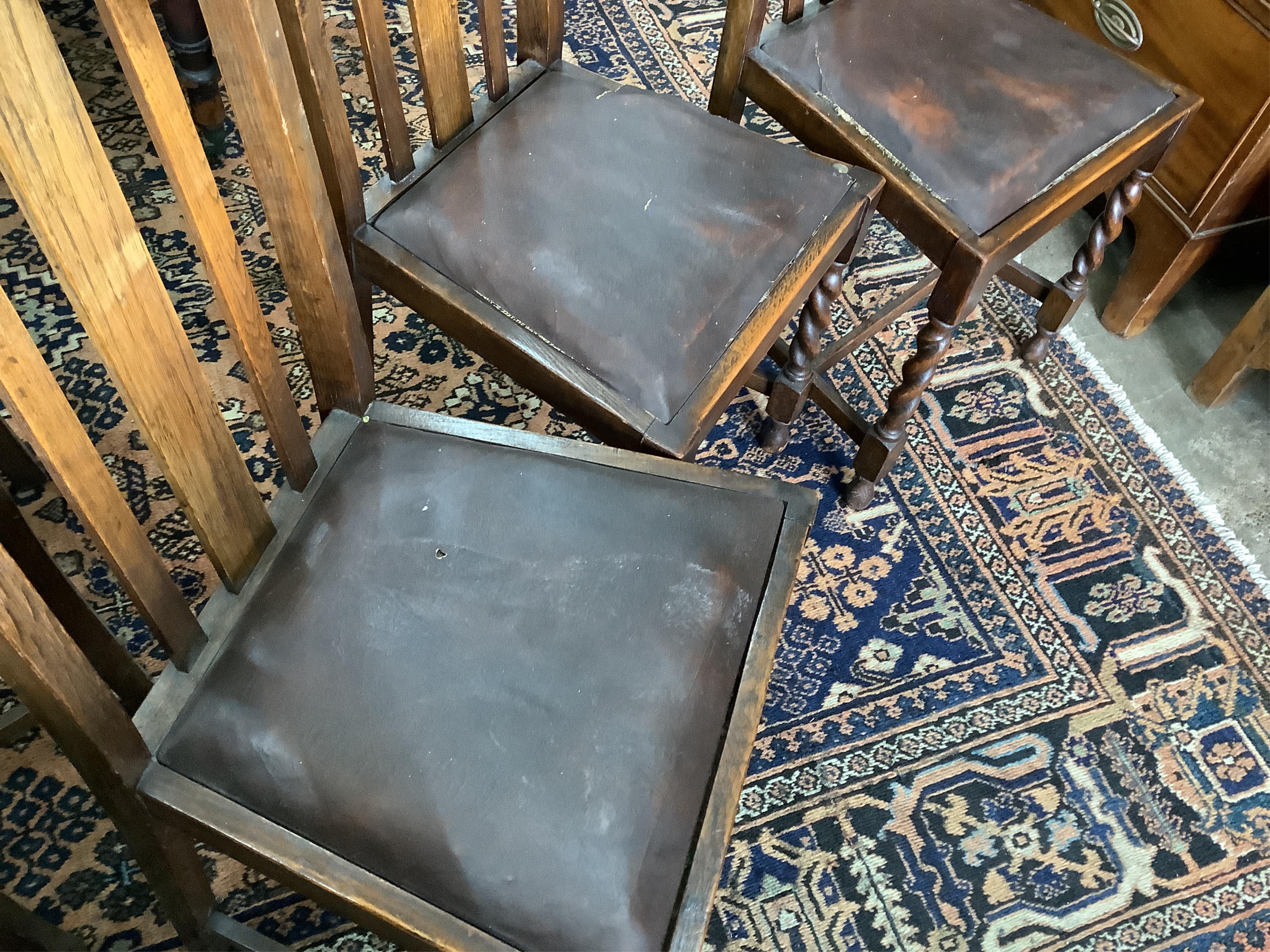 Eight 1920's oak dining chairs, two with arms
